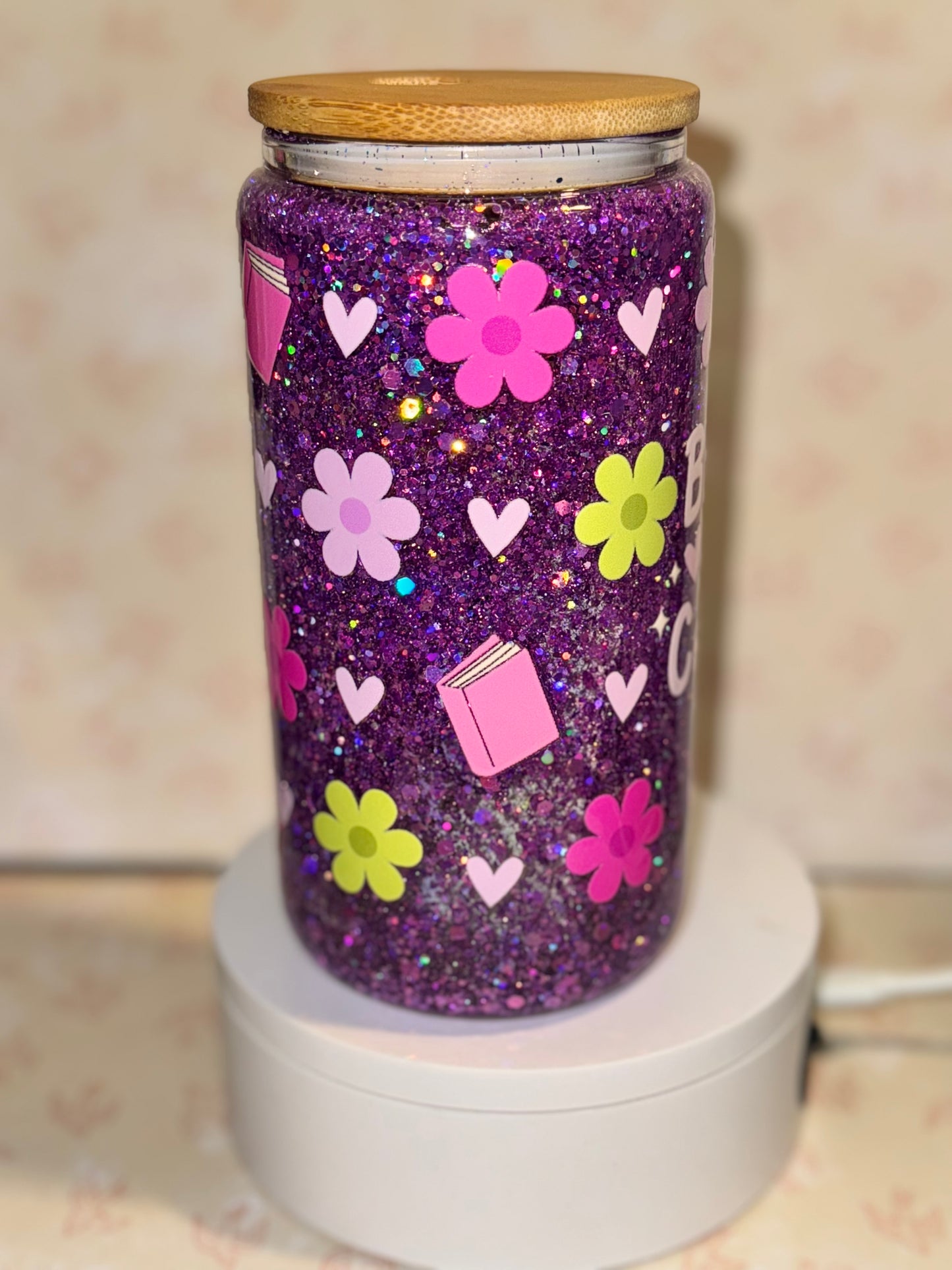 Books and coffee snow globe