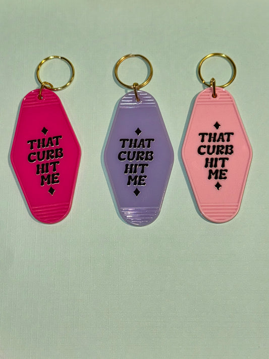 That curb hit me motel keychain